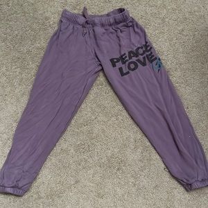 Purple followers by zoe sweatpants. Kids size large.